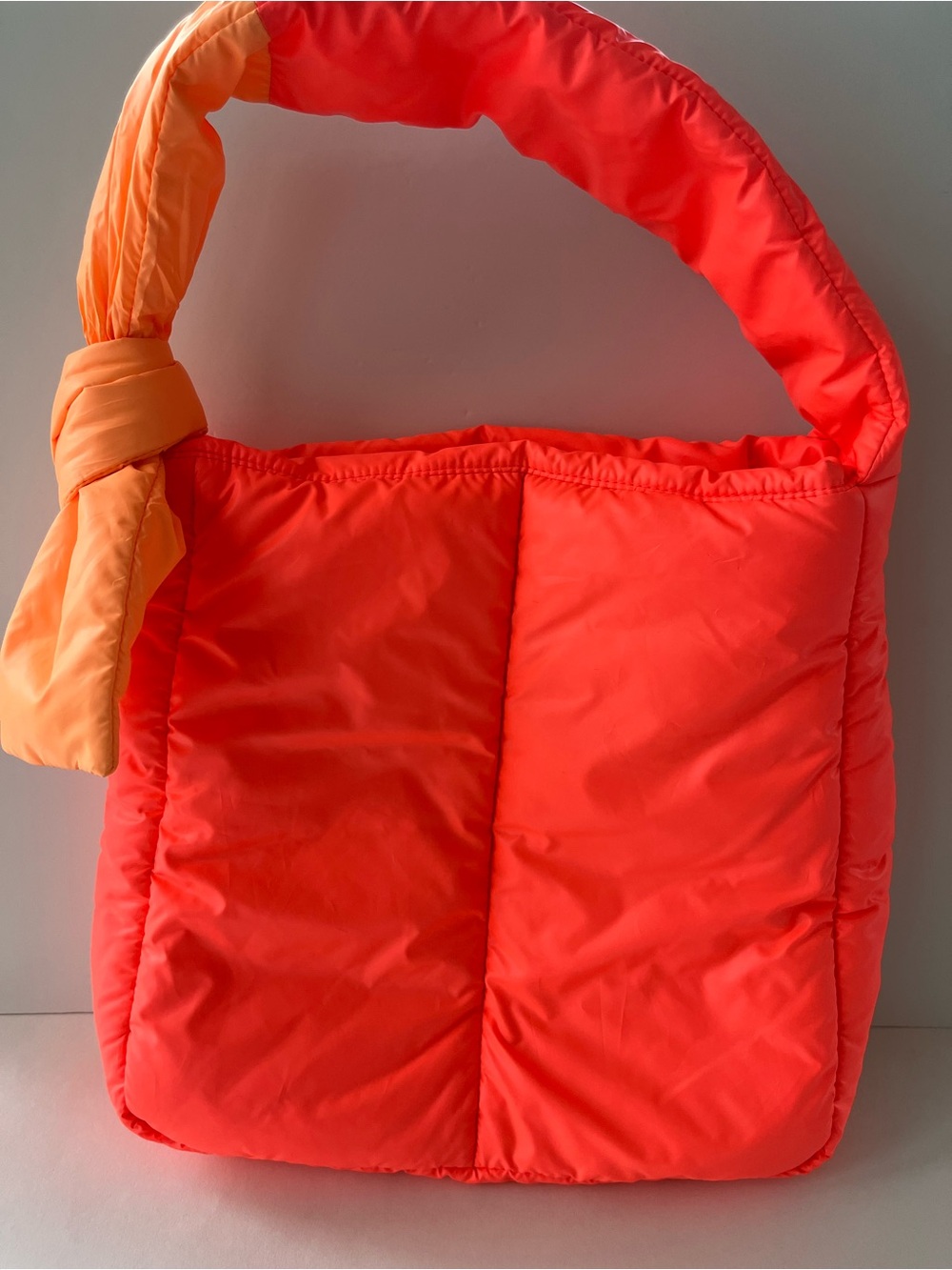 Caraa Sport Puffer Shoulder Bag in Neon Coral- Adjustable shoulder strap